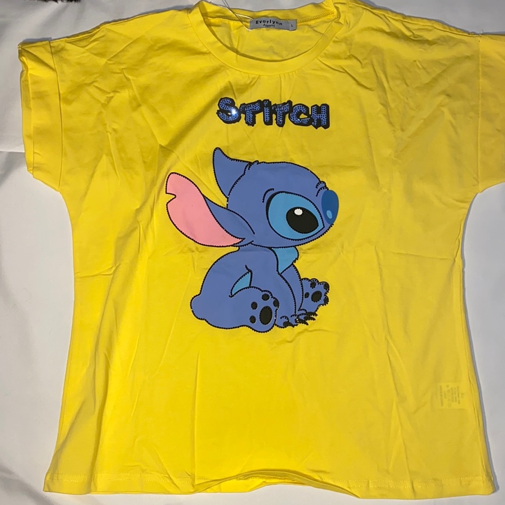 A yellow Stitch Shirt
